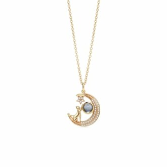 Collier pendentif chat doré avec lune et étoile.