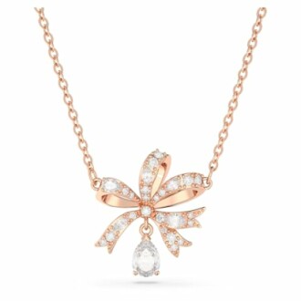 Collier en or rose avec pendentif nœud et diamants.